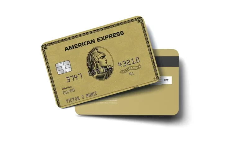 American Express Gold Card featuring a golden metallic design with embossed centurion logo and chip