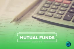 Calculator and financial papers illustrating mutual funds investment.