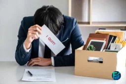 A man holding a resignation letter that says “I Quit,” symbolizing quiet quitting.