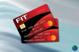 Two red and black FIT Mastercard credit cards on a light gradient background, representing the FIT Mastercard designed for building or improving credit.