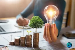 Stacks of coins with plants growing on top and a glowing light bulb, symbolizing financial sustainability and smart investment growth.