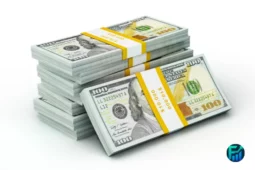 Stacks of hundred-dollar bills representing instant payments with FedNow.