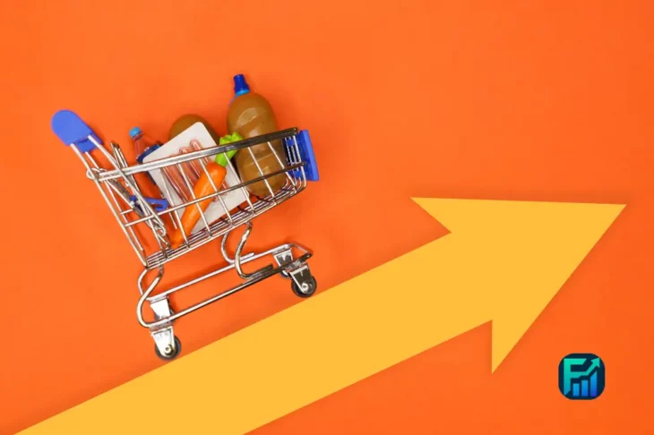 Shopping cart with groceries and an upward arrow, symbolizing rising inflation.