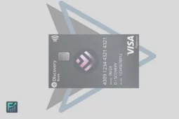 A Discovery Bank Platinum Credit Card with a sleek grey design and Visa branding displayed on a grey background.