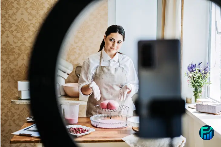 Woman filming a baking video as a side hustle in Canada, representing creative ways to earn extra income.