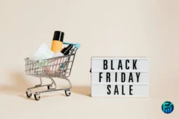 Shopping cart with products beside a Black Friday Sale sign representing Black Friday 2025 discounts.