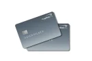 Two Quicksilver Capital One credit cards, representing a flat-rate cash back rewards card.