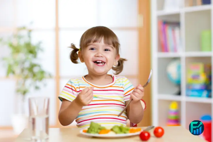 Child enjoying healthy food, free summer meals for kids