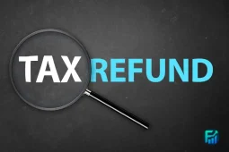 Tax refund concept with a magnifying glass